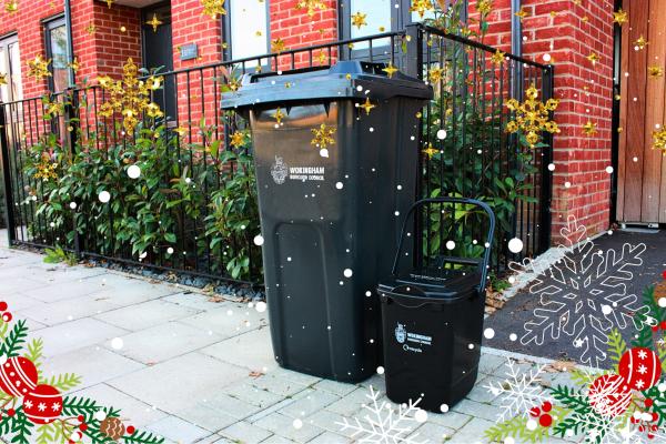 General waste bin and food waste caddy outside a red brick property