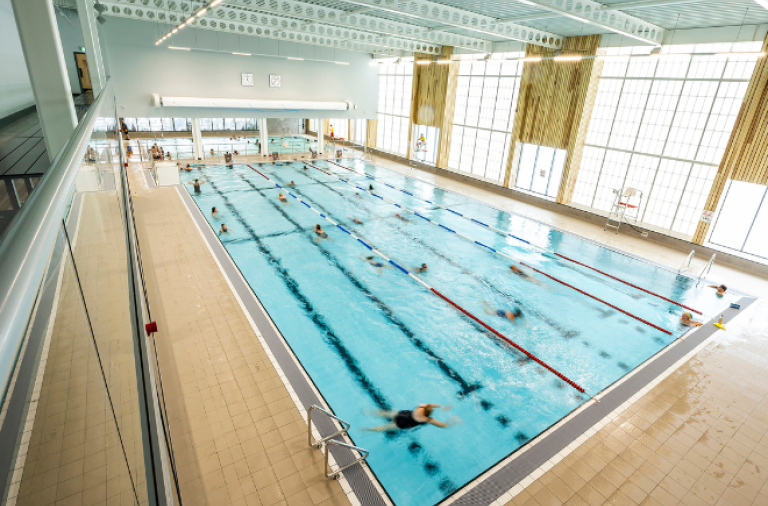 Swimmers in the main swimming pool at Carnival Hub