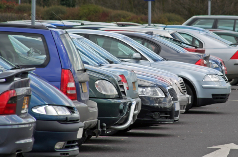 A row of parked cars in a car park
