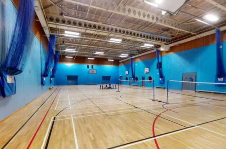 The badminton courts in the sports hall at St Crispin's Leisure Centre