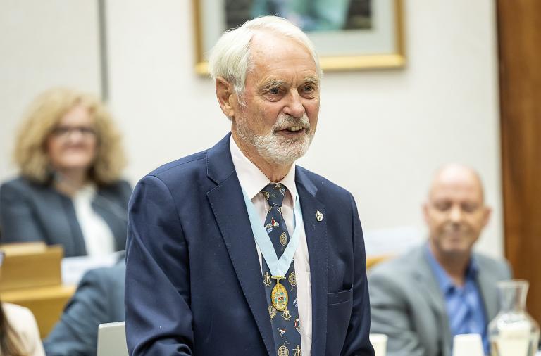 Mr Angus Ross speaking at council