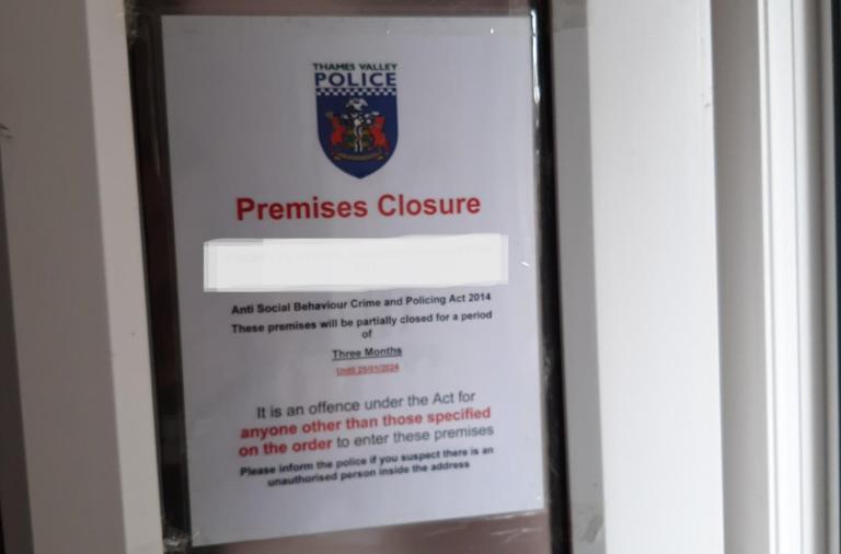 Close up of a closure notice on a front door