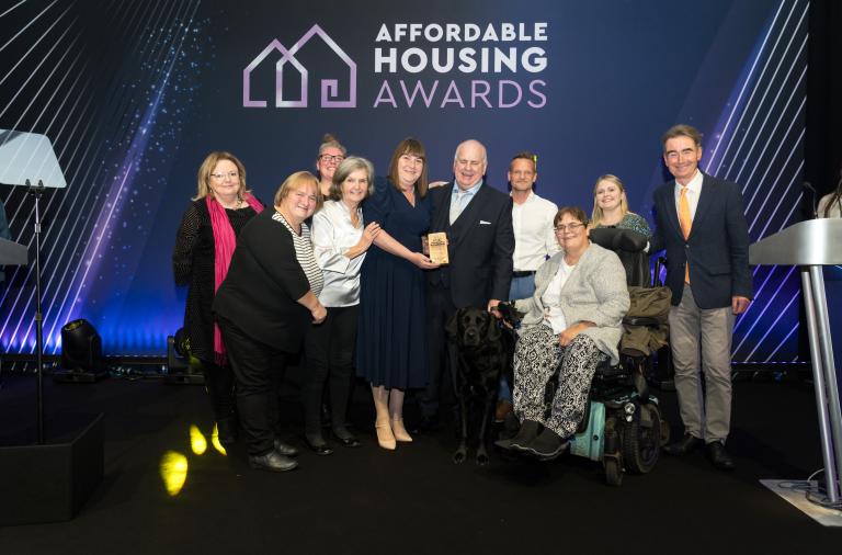 Representatives from the council and tenant group are presented with the award