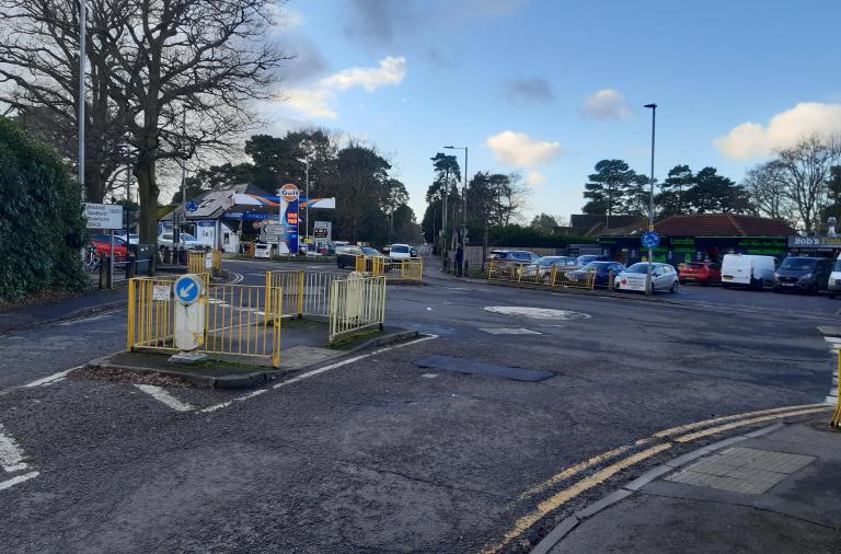 A view of California Cross junction, showing the double roundabouts and Cresswells Garage and Bobs Fish and Chips