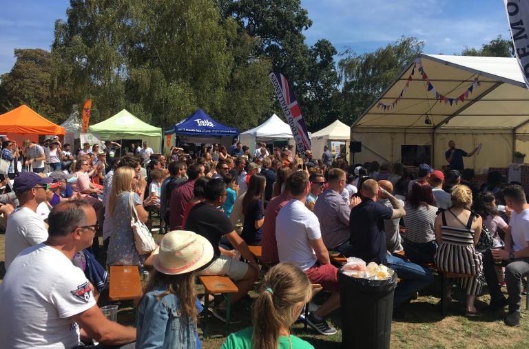 People enjoying demonstrations at Great British Food Festival