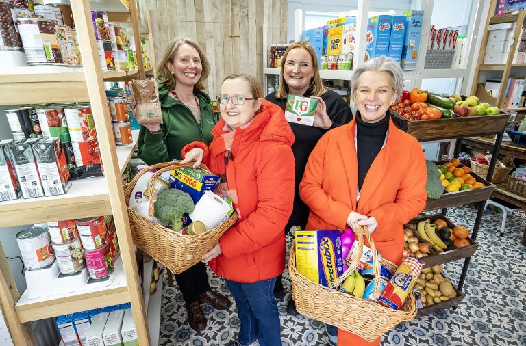 Cllr Rachel Bishop-Firth, Annette Medhurst from Wokingham Foodbank, Emma Cantrell from First Days and Claire Revie from SHARE at the opening of Roots Community Pantry