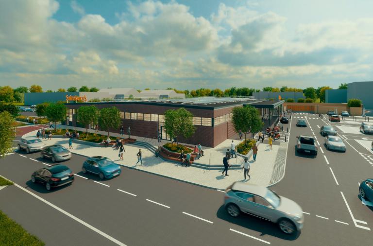 Aerial computer generated view of a Sainsbury's supermarket with car park and trees surrounding it