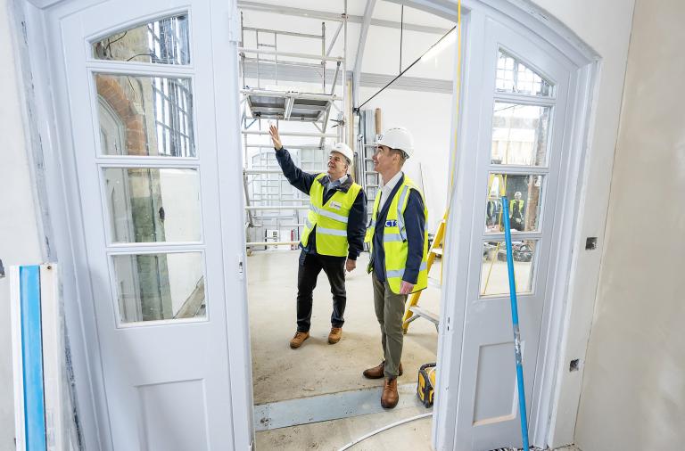 Cllr Stephen Conway and Project Manager Tim Searle discussing historic features in the new Twyford Library hall