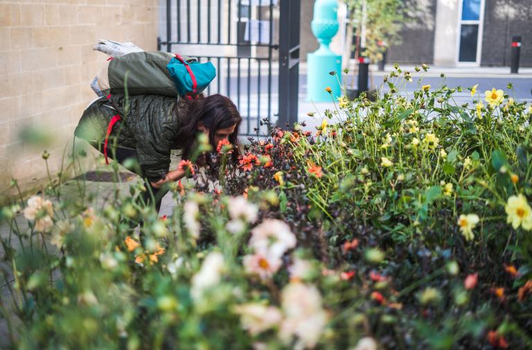 Resident smelling Spring flowers