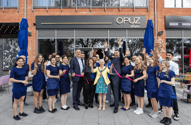 Opuz Wokingham ribbon cutting with borough Mayor Cllr Carol Jewell, Ibrahim and Gokhan Opuz and staff