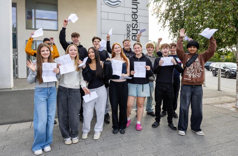 GCSE students with their results outside The Bulmershe School