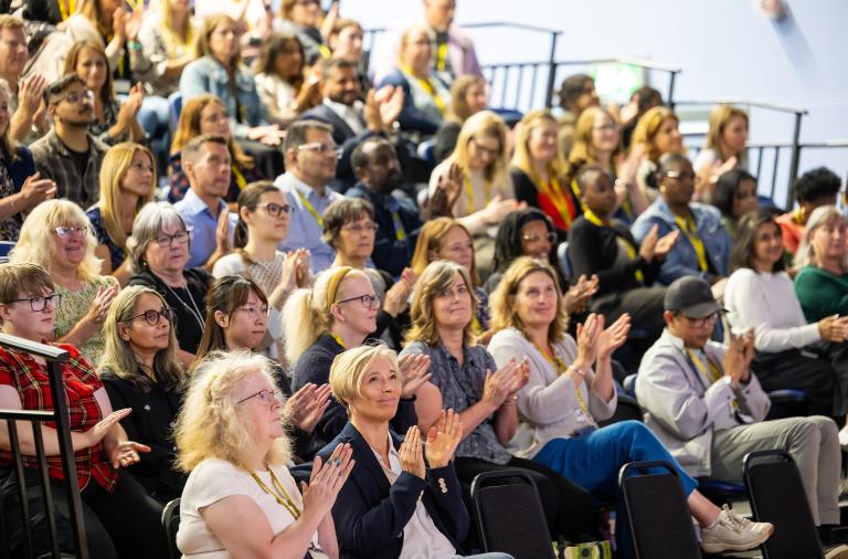 Colleagues applaud during CQC result announcement