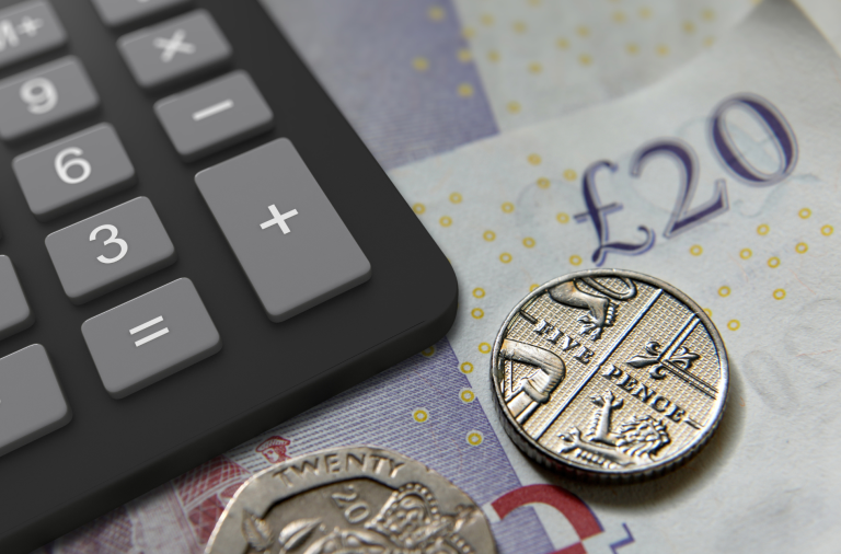 Money next to calculator