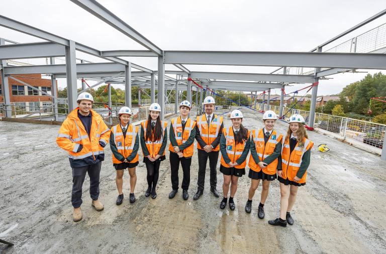 David Bibby, sixth form ambassadors and Francis Construction on the upper floor at Bohunt Wokingham Sixth