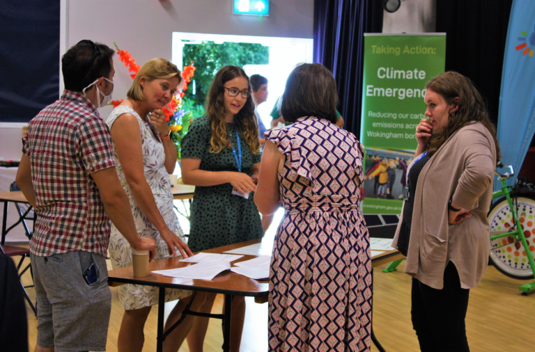 People talking at an environment engagement event