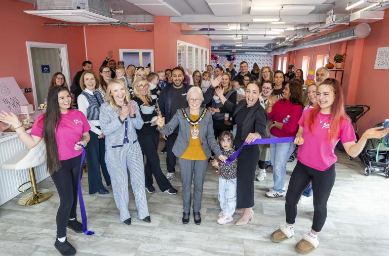 Borough Mayor Cllr Carol Jewell cuts a ribbon with My Little Boardroom staff and visitors