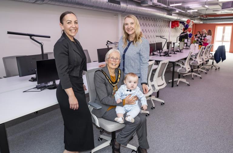 Heather, Maria, Borough Mayor Cllr Carol Jewell and a baby posing in My Little Boardroom