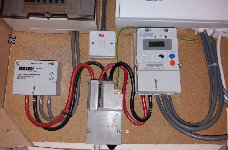 Electric and gas meters wired into a house