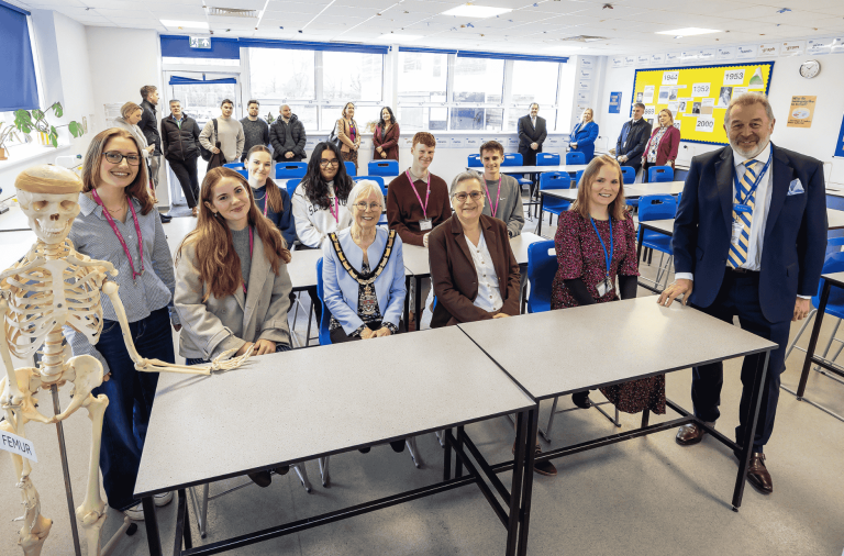The science room with Cllr Prue Bray and Borough Mayor Cllr Carol Jewell, headteacher and pupils from The Piggott School