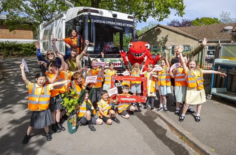 Students celebrate their vehicle naming competition win