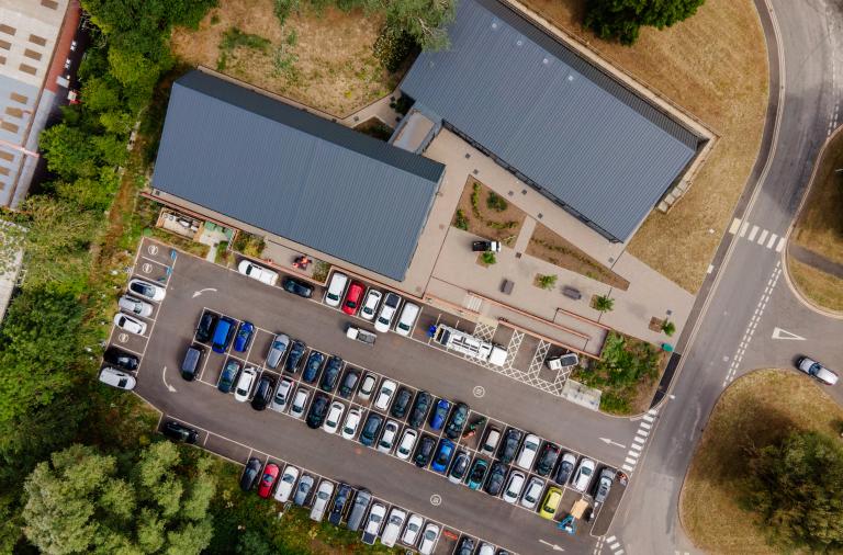 Aerial view of a depot with waste collection vehicles used to support waste, recycling and street cleansing services across Wokingham Borough.