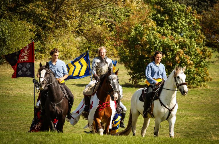 Three knights on horses in Dinton Pastures field