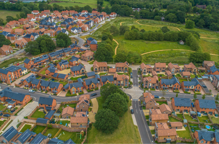 general aerial view by drone of new housing development