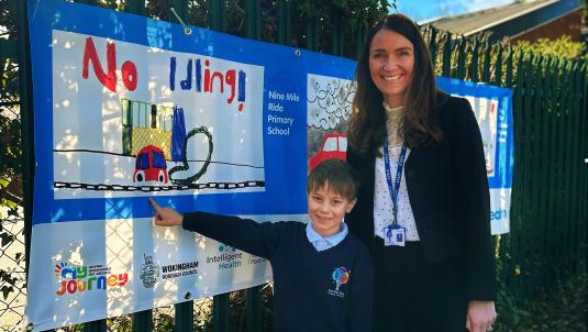 •	Sebastian (Nine Mile Ride Primary School, Finchampstead) with a design showing the fumes emitted from an idling car vehicle in a built-up area