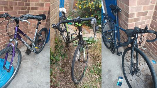 Three bicycles stood up next to different walls, these were returned to owners  after being stolen