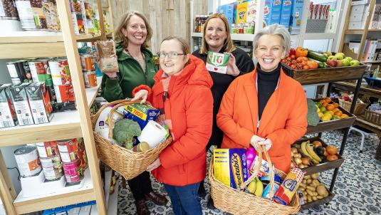 Cllr Rachel Bishop-Firth, Annette Medhurst from Wokingham Foodbank, Emma Cantrell from First Days and Claire Revie from SHARE at the opening of Roots Community Pantry