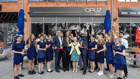 Opuz Wokingham ribbon cutting with borough Mayor Cllr Carol Jewell, Ibrahim and Gokhan Opuz and staff