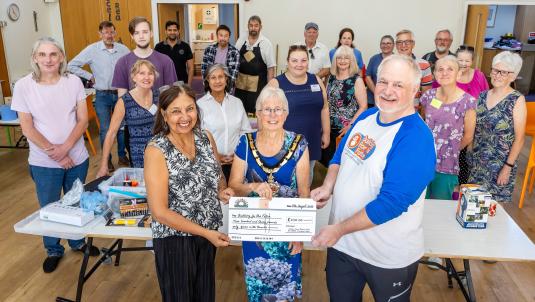 (L-R) Billie Bacha (Chair of Lambs Lane Repair Café), The Mayor and Jason McMahon (Building for the Future- Fundraising Manager) accepting a cheque