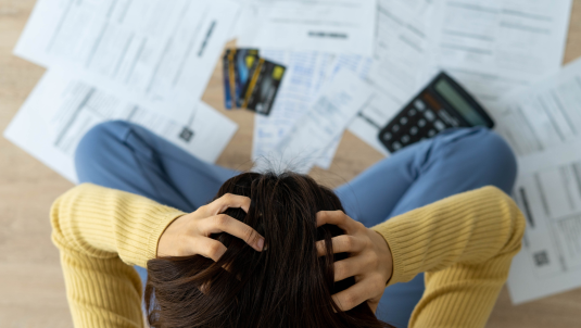 Person looking at bills
