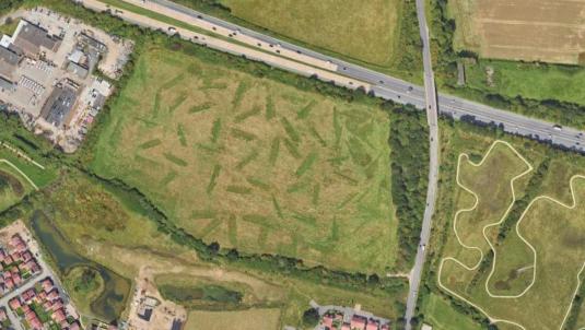 A satellite view of the proposed site with the M4 to the north and Toutley depot to the west