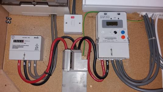 Electric and gas meters wired into a house