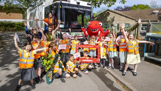 Students celebrate their vehicle naming competition win