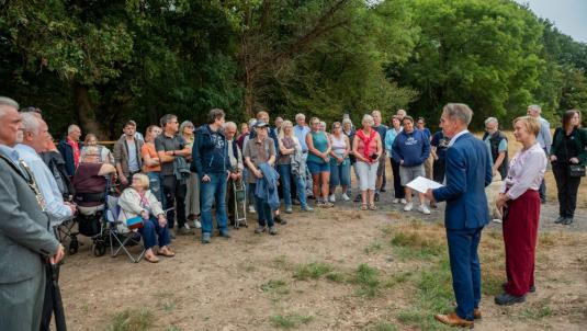 People gathered at the Covid Memorial Woodland during the official opening event near California Country Park.
