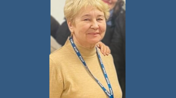 Nina from Ukraine smiles into the camera