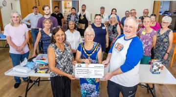 (L-R) Billie Bacha (Chair of Lambs Lane Repair Café), The Mayor and Jason McMahon (Building for the Future- Fundraising Manager) accepting a cheque