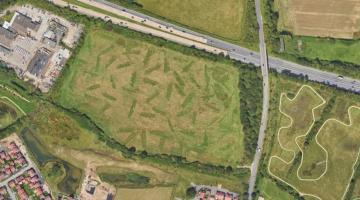 A satellite view of the proposed site with the M4 to the north and Toutley depot to the west