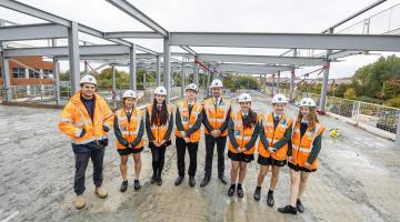 David Bibby, sixth form ambassadors and Francis Construction on the upper floor at Bohunt Wokingham Sixth
