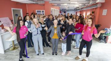 Borough Mayor Cllr Carol Jewell cuts a ribbon with My Little Boardroom staff and visitors