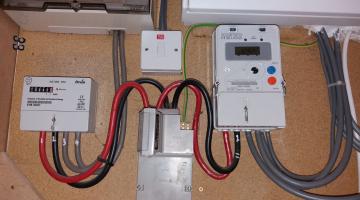 Electric and gas meters wired into a house