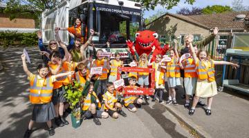 Students celebrate their vehicle naming competition win
