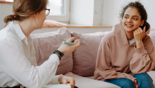 A young adult getting advice