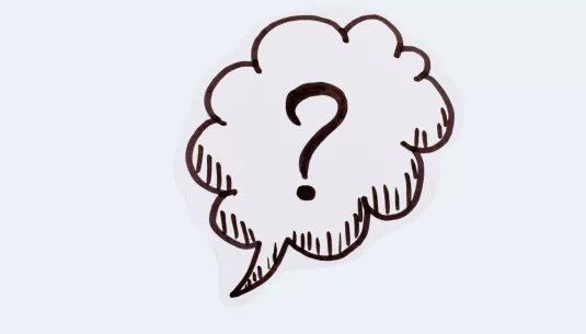 A question mark inside a thought bubble