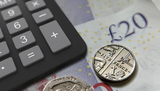 Money next to calculator