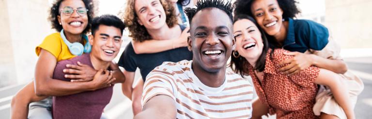 Group of young people laughing together