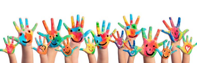A group of painted children's hands up in the air