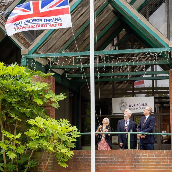 Armed Forces Day 2025 flag raising ceremony. [L-r] Cllr Adrian Betteridge, Wokingham Borough Mayor, Cllr Carol Jewell, and Honorary Alderman Angus Ross